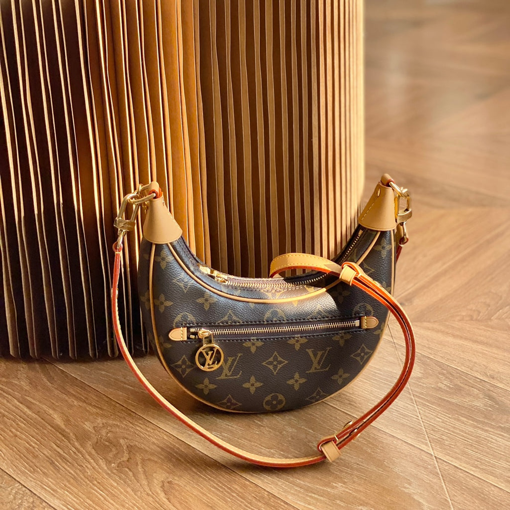 M81098 特級全鋼代購版本#15960 23 x 13 x 6 厘米(長度x 高x 寬) Monogram 塗層帆布牛皮革飾邊微纖維內襯金屬件拉鍊前袋配有LV Circle 標識拉鍊頭拉鍊開合肩帶：可拆卸，可調節包帶半長：35.0 厘米包標識拉鍊頭帶 50.